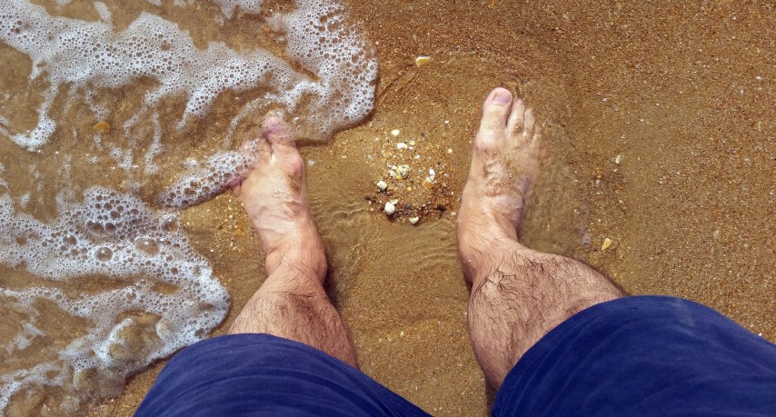 Fuesse im Sand